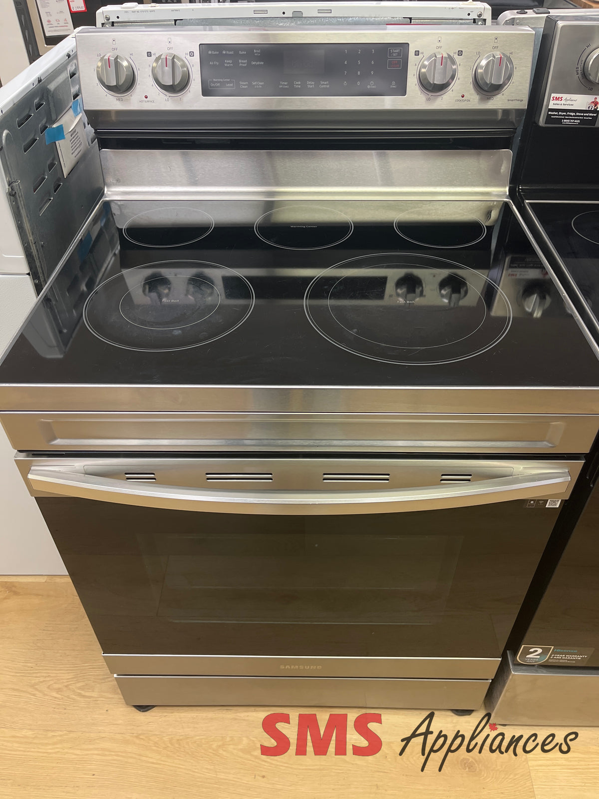 Refurbished Samsung NE63A6511SS/AC stove close-up - SMS Appliances