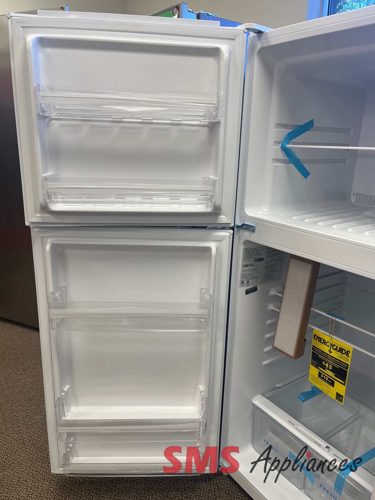 Frigidaire FFET1222UW open box fridge view - for sale in Calgary