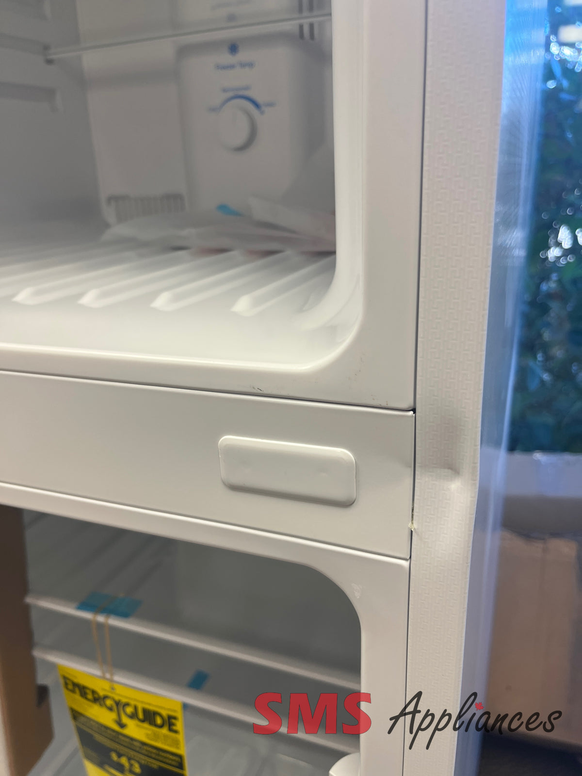 Open Box Frigidaire FFET1222UW fridge close-up - SMS Appliances