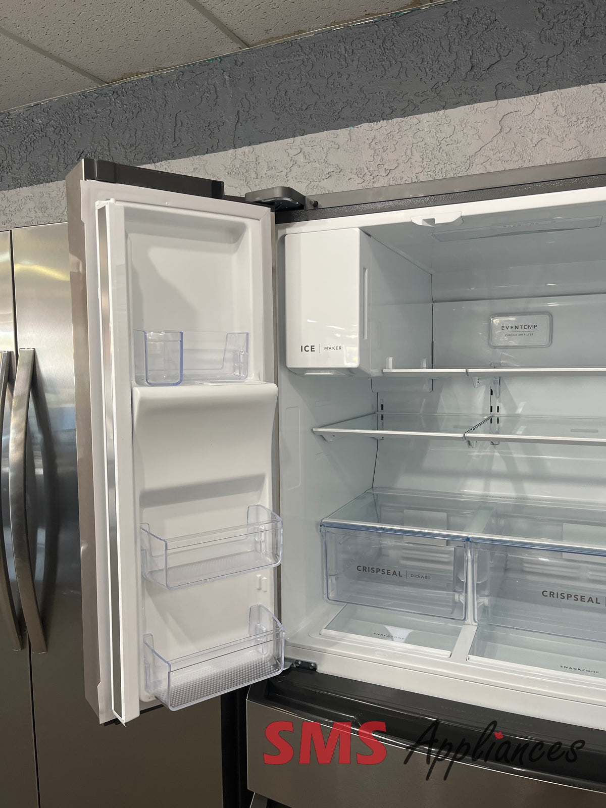 Frigidaire FRMS274TAV open box fridge view - for sale in Medicine Hat