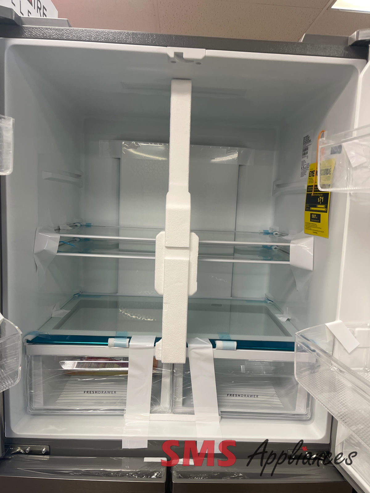 Open Box Frigidaire FRQG1721AV fridge close-up - SMS Appliances