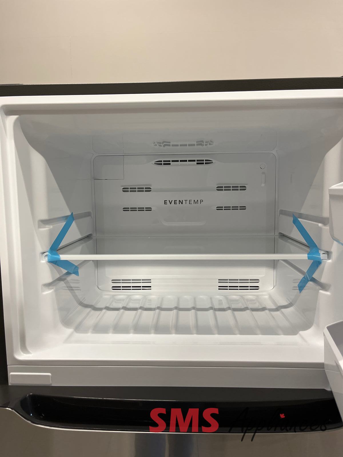 Frigidaire FRTE1835AS open box fridge photo at SMS Appliances Calgary