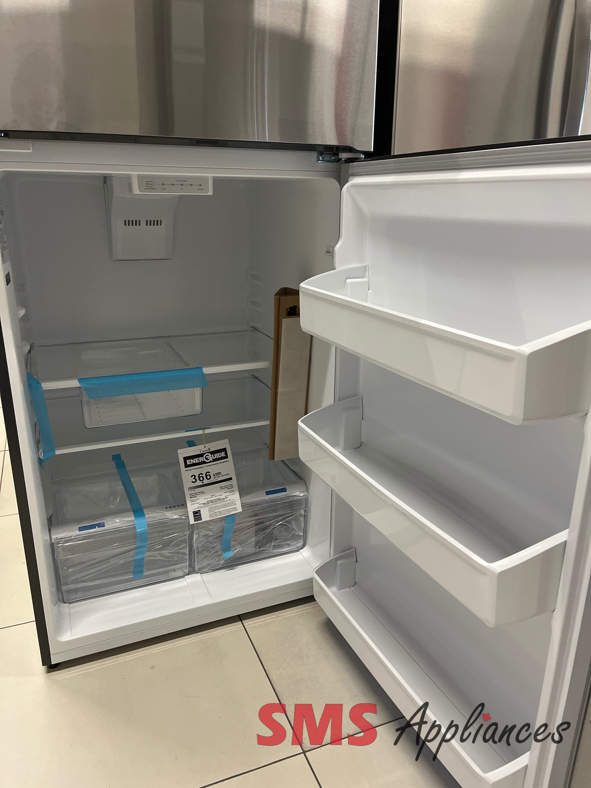 Open Box Frigidaire FRTE1835AS fridge close-up - SMS Appliances