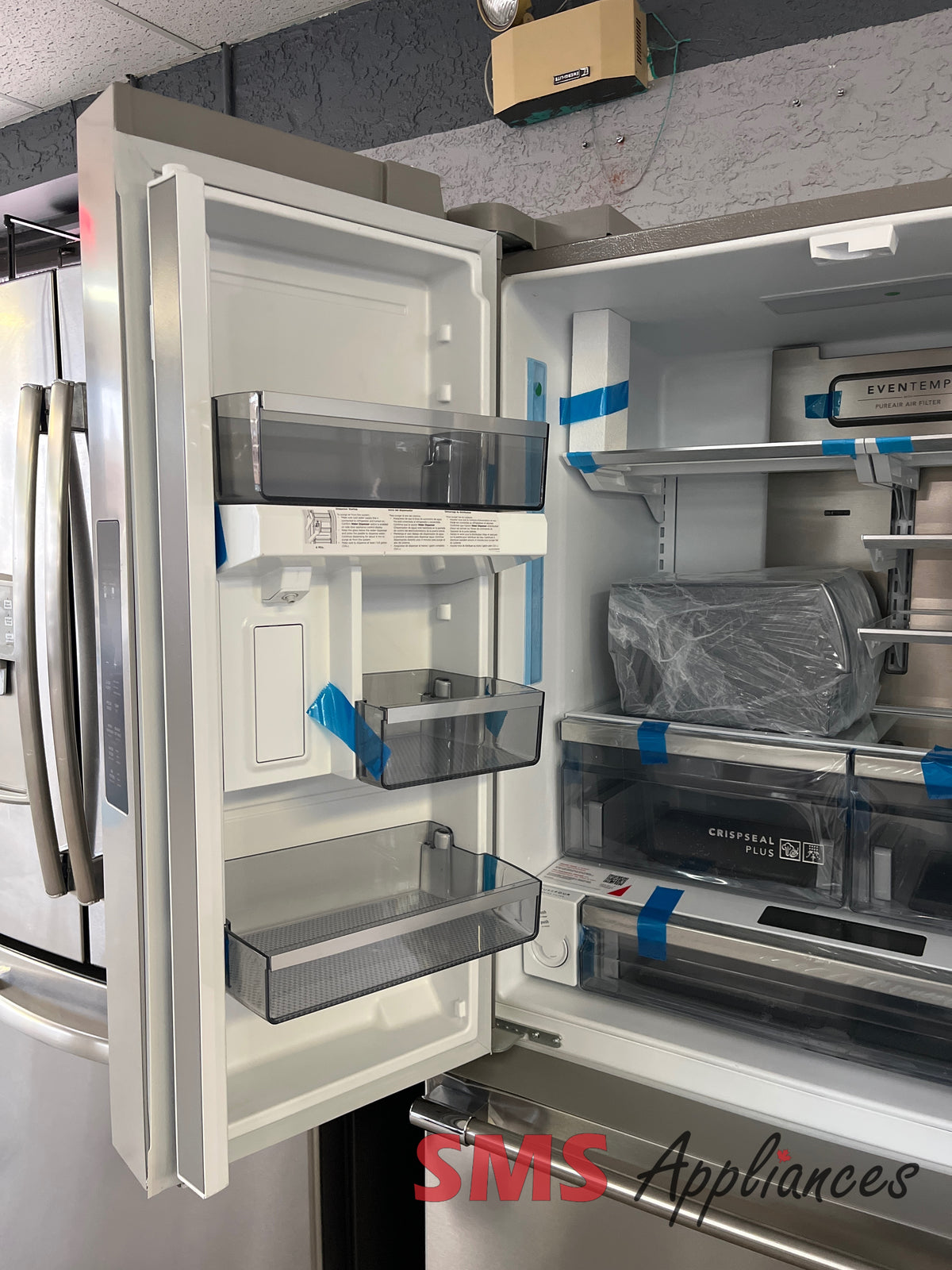 Frigidaire PRFG2383AF open box fridge view - for sale in Medicine Hat