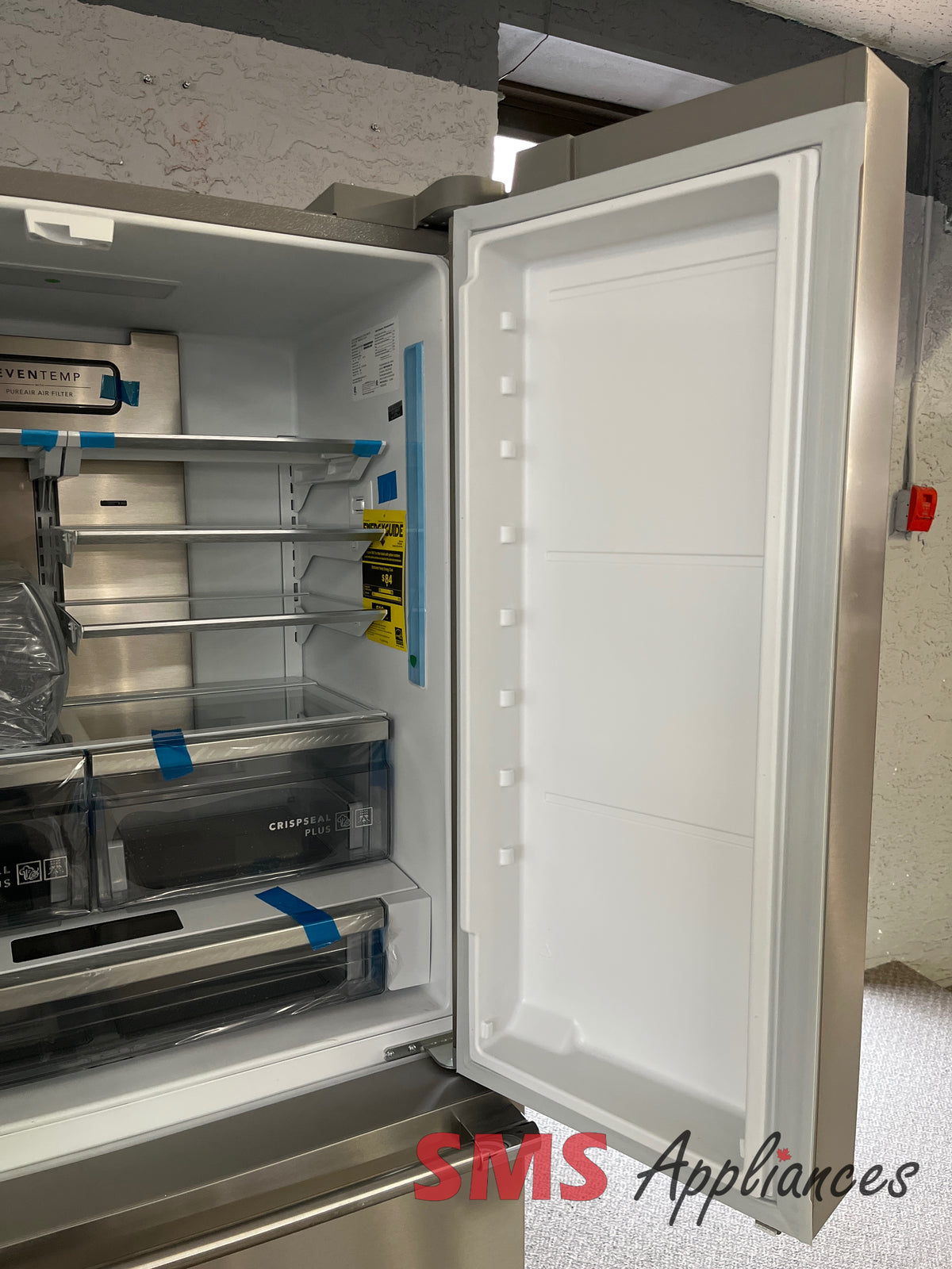 Open Box Frigidaire PRFG2383AF fridge close-up - SMS Appliances