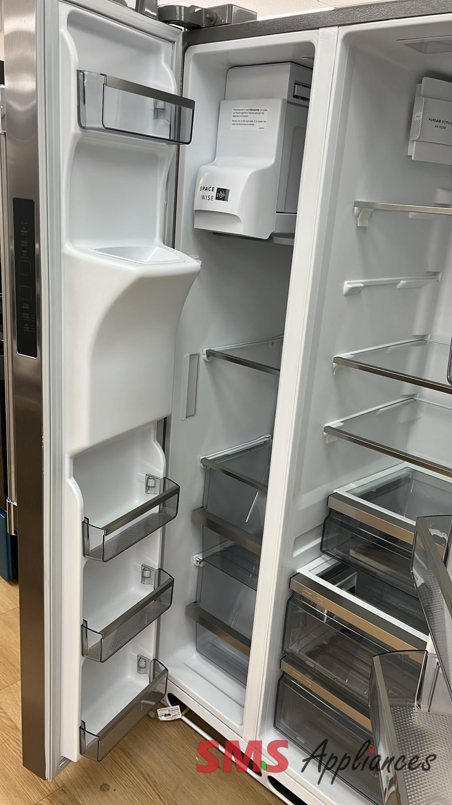 Open Box Frigidaire PRSC2222AFB fridge close-up - SMS Appliances
