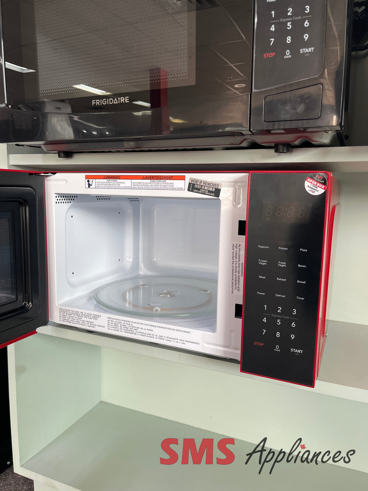 Frigidaire EMW953-RED open box microwave photo at SMS Appliances Medicine Hat