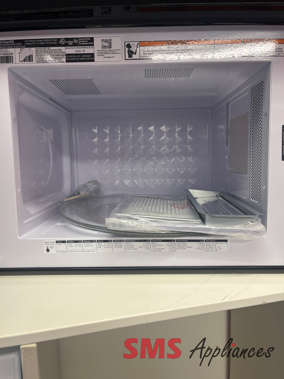 Frigidaire UMV1422UW open box microwave view - for sale in Calgary