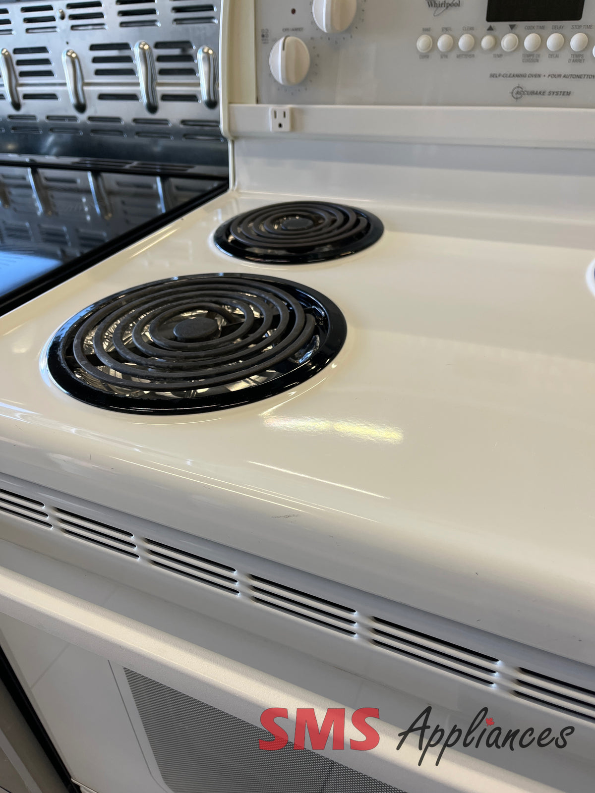 Refurbished Whirlpool WGP34802 stove close-up - SMS Appliances