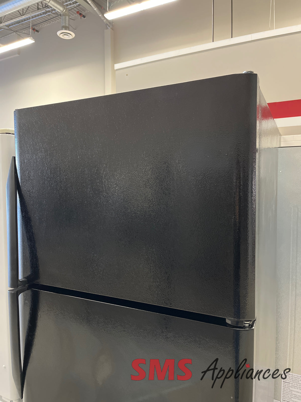 Frigidaire FRT21S6ABH refurbished fridge photo at SMS Appliances Calgary