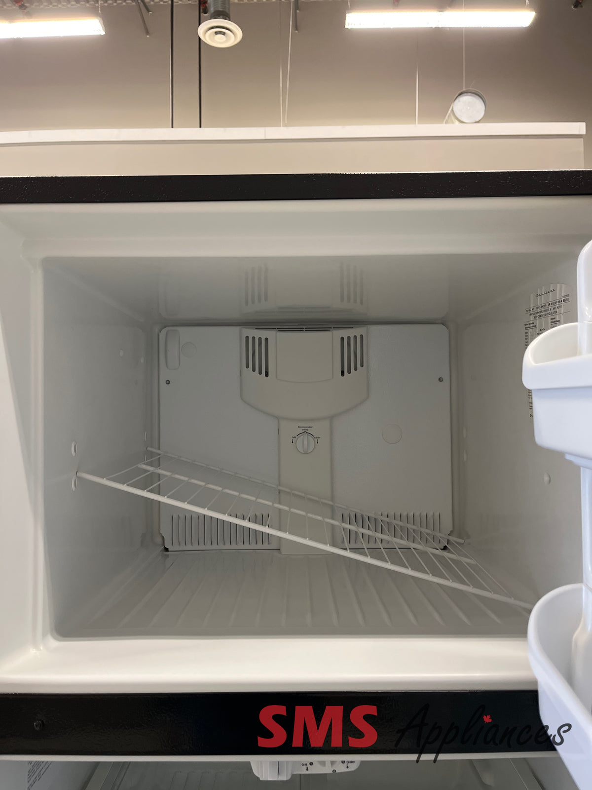 Frigidaire FRT21S6ABH refurbished fridge detail - buy in Calgary at SMS Appliances