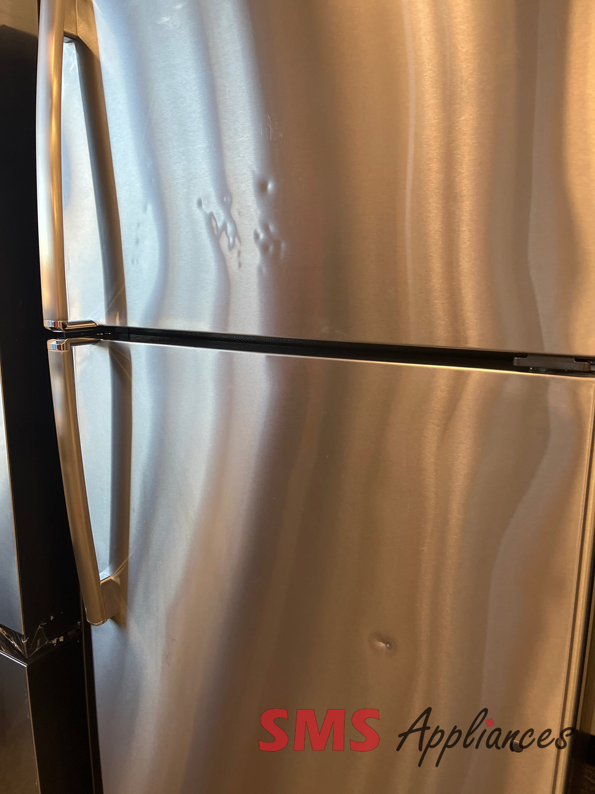 GE GTE18GSHBRSS refurbished fridge detail - buy in Calgary at SMS Appliances