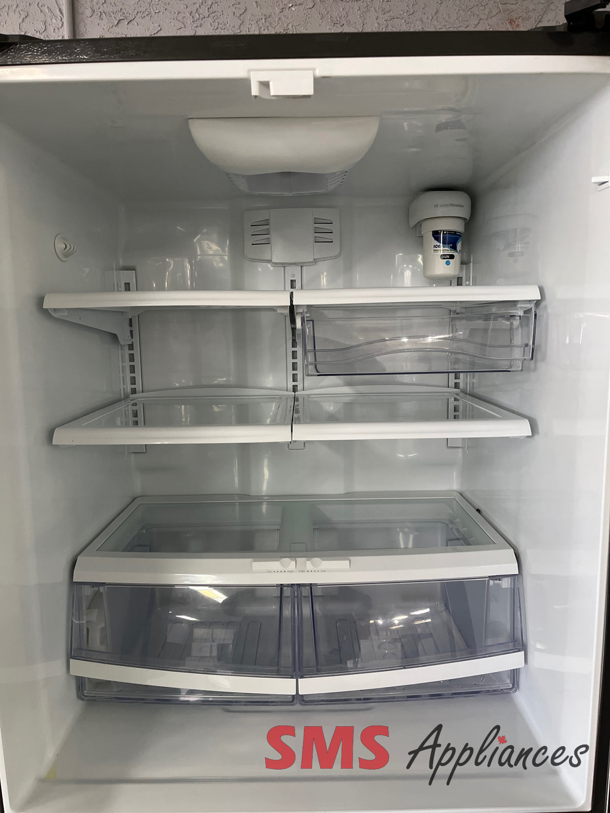 GE PNR22MSEAFES refurbished fridge view - for sale in Medicine Hat