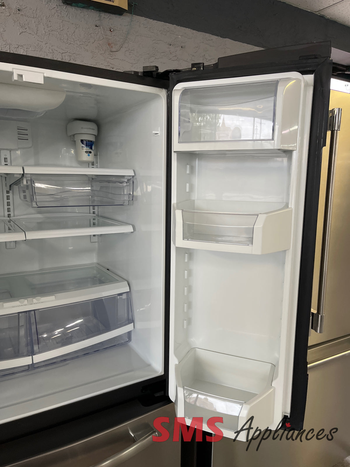 33" GE PNR22MSEAFES refurbished fridge - SMS Appliances Medicine Hat