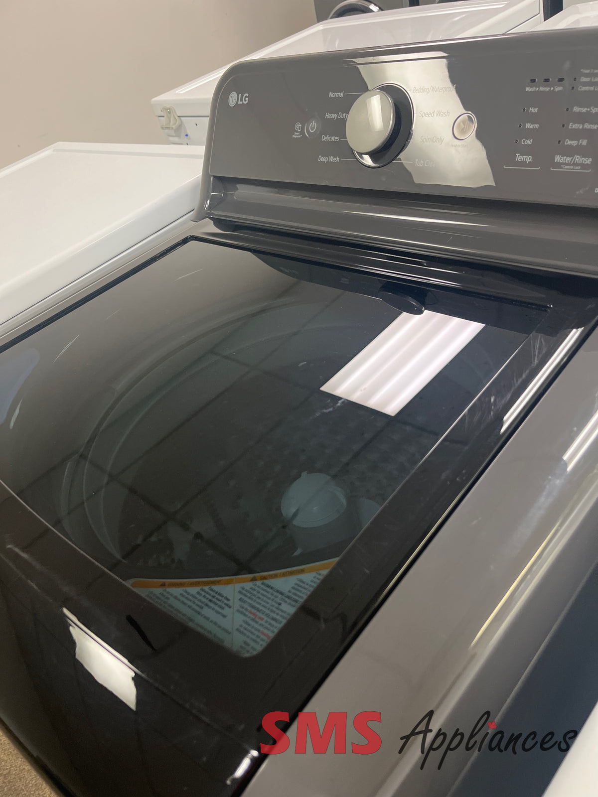 Refurbished LG WT6105CM washer close-up - SMS Appliances