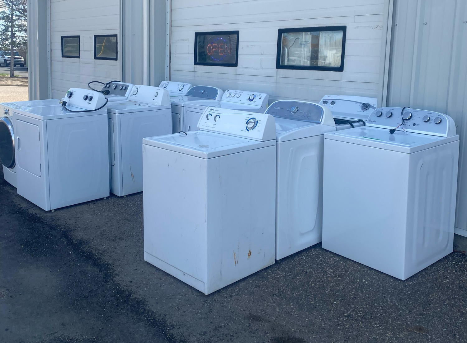 Fast and safe appliance removal services in Airdrie by SMS Appliances, offering professional haul-away of old fridges, washers, dryers, stoves, and other household appliances.