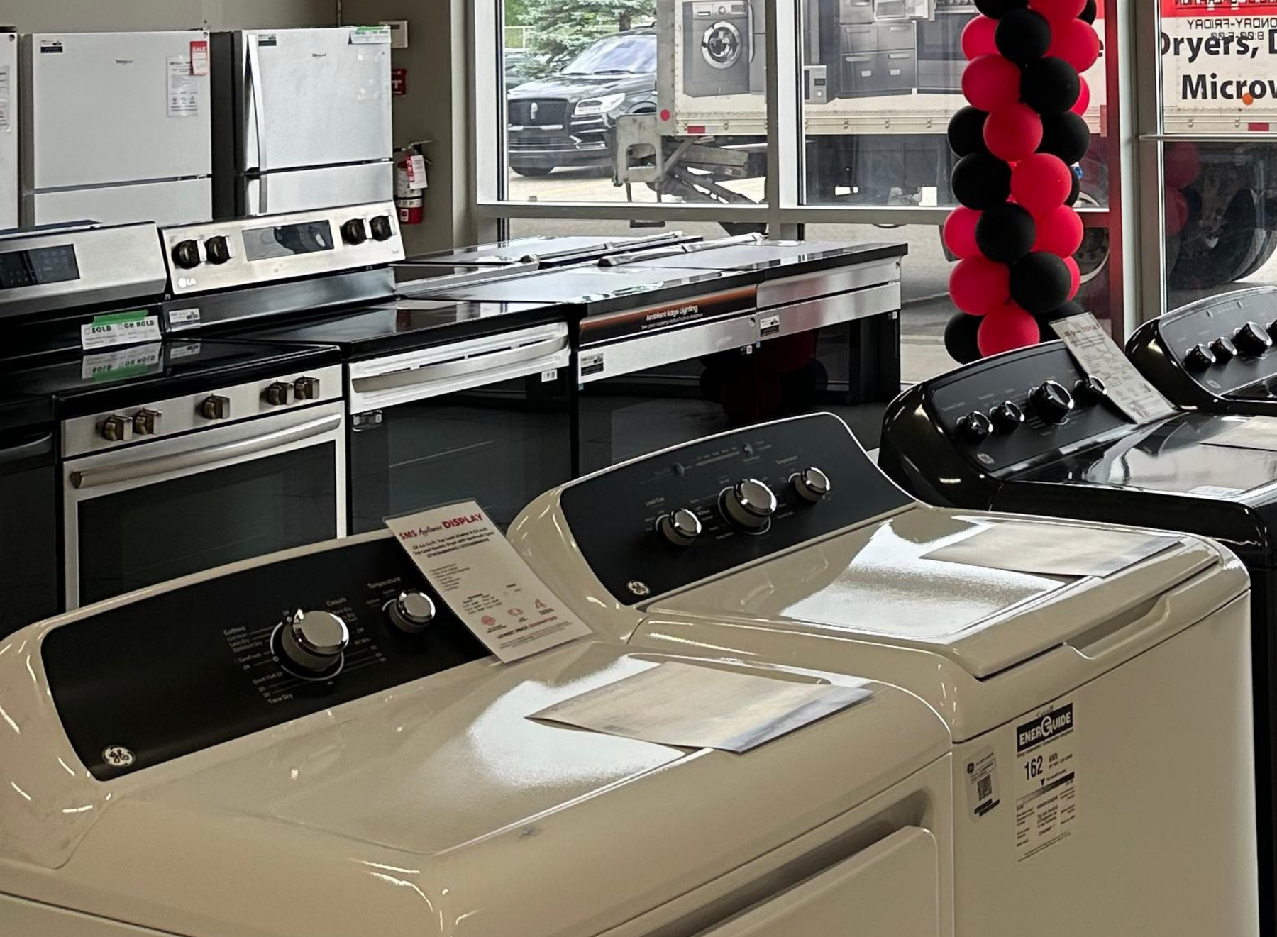 New home appliances at SMS Appliances Medicine Hat, including fridges, washers, dryers, stoves, and dishwashers with professional delivery and installation services.